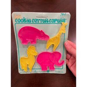 Set of 4 vintage “Cookie Cutter Capers" cookie cutters